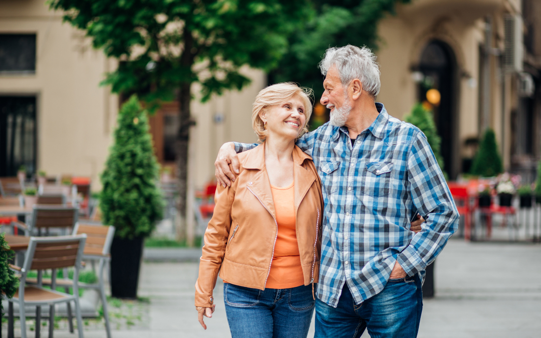 Happy older couple walking after a meal