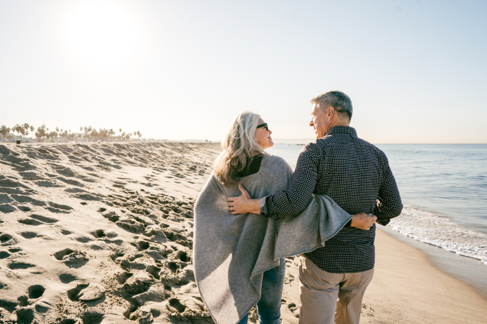 Middle aged couple on the beach